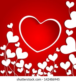 Love concept with heart shape on red background.