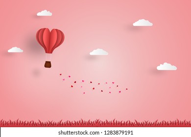 love concept,heart design hot air balloon on pink background. paper art design for valentine day