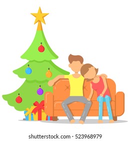 Love couple sitting on the sofa near the Christmas tree on Christmas eve. Icon with a festive interior.