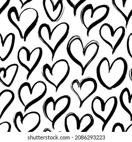 Love doodle background with hearts. Vector hand drawn grunge seamless pattern. Black and white ink illustration. Abstract seamless heart pattern. Saint Valentines day wrapping paper design
