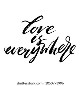 Love is everywhere words. Hand drawn creative calligraphy and brush pen lettering, design for holiday greeting cards and invitations.