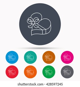 Love gift box icon. Heart with bow sign. Icons in colour circle buttons. Vector