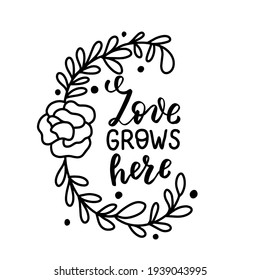 Love grows here. Hand lettering boho celestial quote. Wild flowers wreathe. Gypsy rustic bohemian vector illustration for shirt design. Boho clipart.  svg