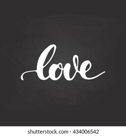 Love - hand drawn lettering phrase, isolated on the chalkboard background. Fun brush ink inscription for photo overlays, typography greeting card or t-shirt print, poster design.