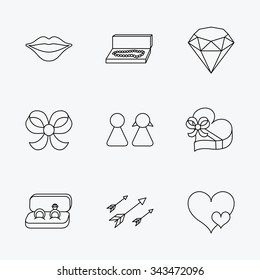 Love heart, gift box and wedding rings icons. Kiss lips and couple linear signs. Valentine amour arrows, brilliant flat line icons. Linear black icons on white background.