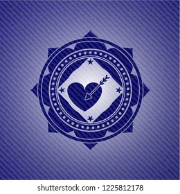 love icon inside badge with denim texture