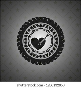 love icon inside black badge