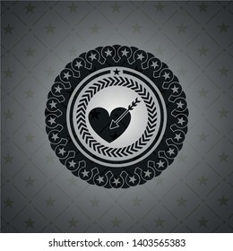 love icon inside black emblem