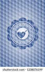 love icon inside blue polygonal badge.