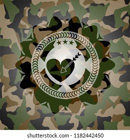 love icon inside camouflage emblem
