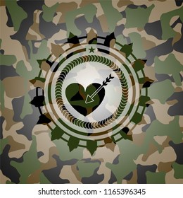 love icon inside camouflage texture