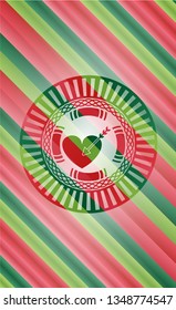 love icon inside christmas badge.