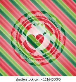 love icon inside christmas colors emblem.