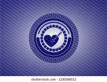 love icon inside denim background