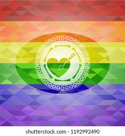 love icon inside emblem on mosaic background with the colors of the LGBT flag