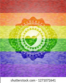 love icon inside emblem on mosaic background with the colors of the LGBT flag