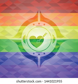 love icon inside emblem on mosaic background with the colors of the LGBT flag