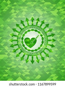 love icon inside green emblem. Mosaic background