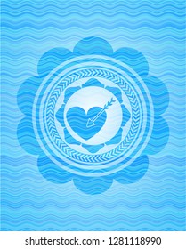 love icon inside light blue water wave style badge.