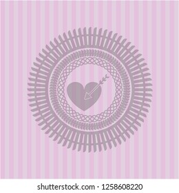 love icon inside pink icon or emblem