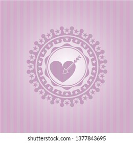 love icon inside pink emblem