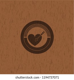 love icon inside realistic wooden emblem