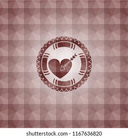 love icon inside red emblem or badge with abstract geometric polygonal pattern background.
