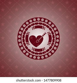 love icon inside red emblem