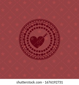 love icon inside red icon or emblem