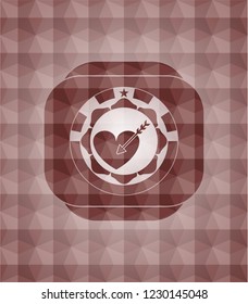 love icon inside red seamless emblem or badge with abstract geometric polygonal pattern background.