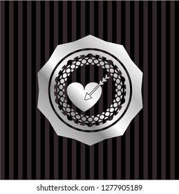 love icon inside silver badge
