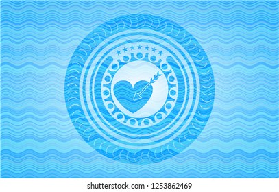 love icon inside water badge background.
