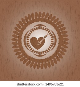 love icon inside wooden emblem. Vintage.