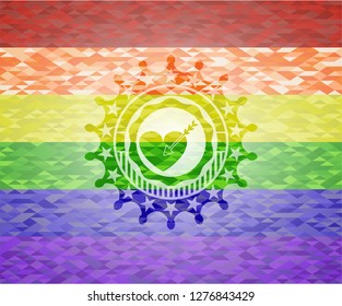 love icon on mosaic background with the colors of the LGBT flag