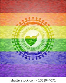 love icon on mosaic background with the colors of the LGBT flag