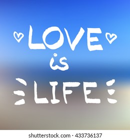 Love is Life lettering. Romantic quote on blurred background vector.