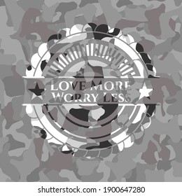 Love More Worry Less written on a grey camo texture 