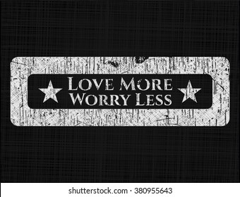 Love More Worry Less written with chalkboard texture