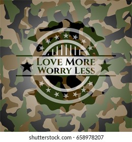 Love More Worry Less written on a camouflage texture