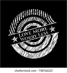 Love More Worry Less written with chalkboard texture
