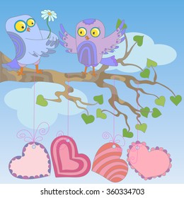 Love owls sit on a tree branch on blue sky background, postcard Valentine's day 