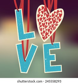 love paper garland on blurred background