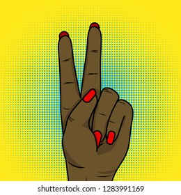 Love and peace. Pop art background with female hand with victory sign and speech bubble .Negroid woman hand show victory sign vector.