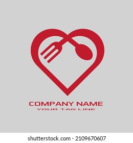 Logotipo del bifurcación y la cuchara del restaurante de amor