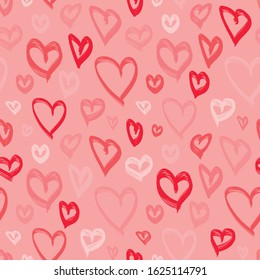 Love romantic seamless pattern with hand drawn hearts. Valentine's day background with red heart shapes on pink backdrop. Doodle style illustration. Repeat design for decor, print, wrap, wallpapers