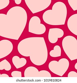 Love seamless pattern with hearts. Valentine's day background. Vector abstract texture with big and small scattered hearts. Red and pink colors. Festive design for decor, gift paper, textile, cards