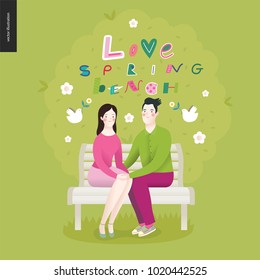 Love, spring, bench lettering - a couple in love sitting on a bench under the tree