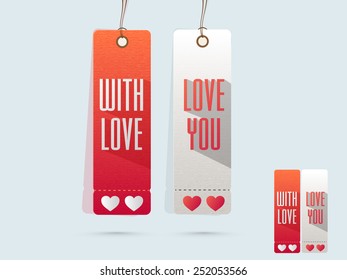 Love tags with hearts for Happy Valentines Day celebration on shiny sky blue background.