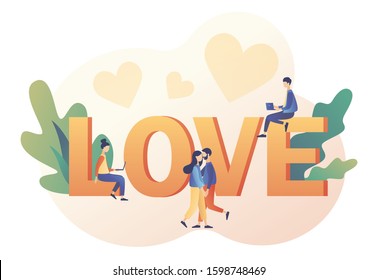 In love. Tiny people with big LOVE inscription. Loving couple hugging. Love relationships at a distance. Valentine day consept. Modern flat cartoon style. Vector illustration on white background