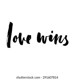 Love wins, ink hand lettering. Modern calligraphy.